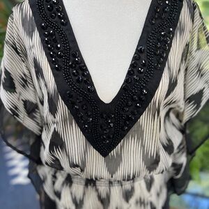Club Collection coverup in black/ivory with beaded neckline, size medium.